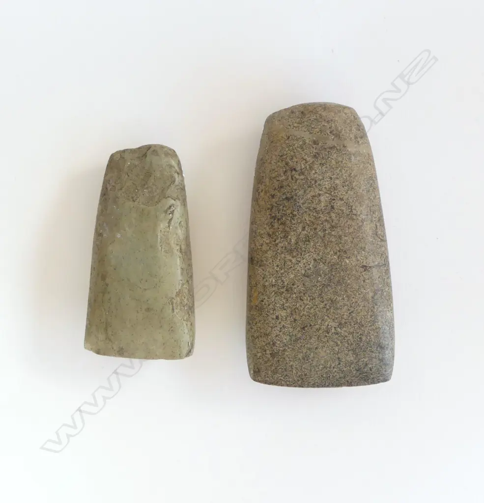 Two old Māori stone toki the larger of speckled grey stone, Image 1++