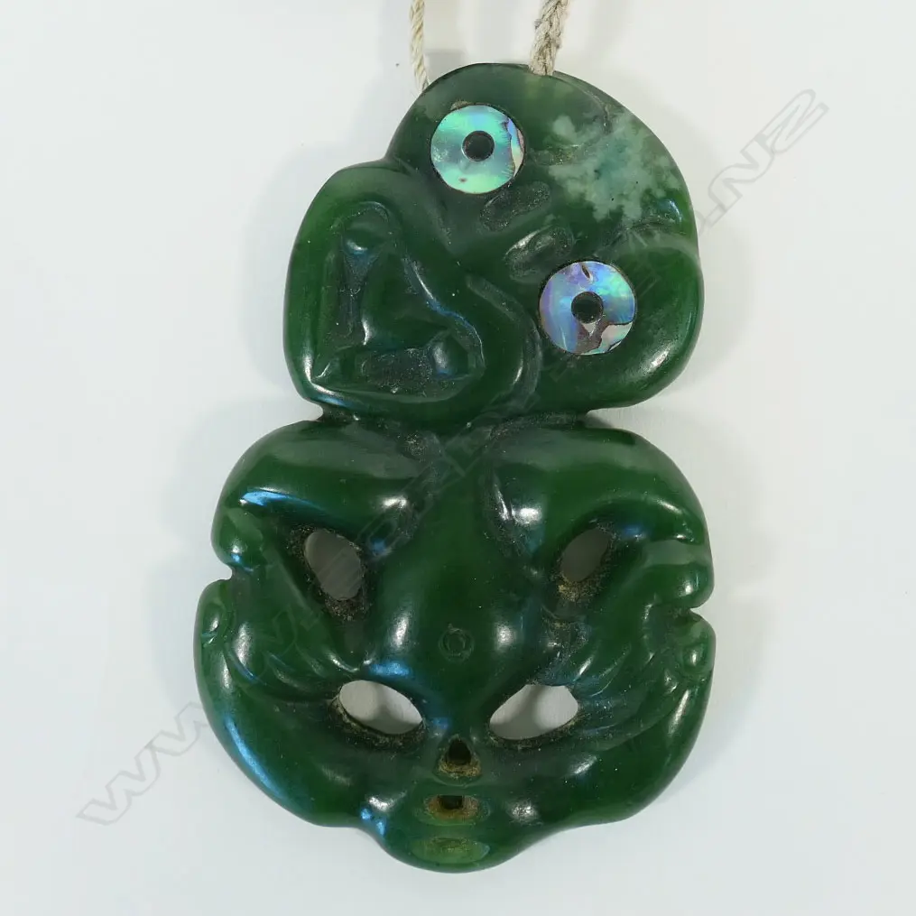 A contemporary pounamu Māori hei tiki, Image 1++