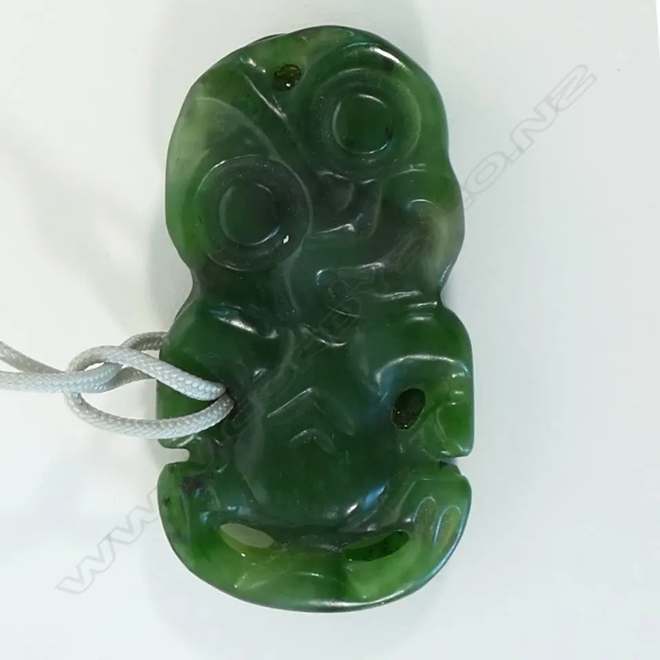 A contemporary Māori double sided pounamu hei tiki, Image 1++