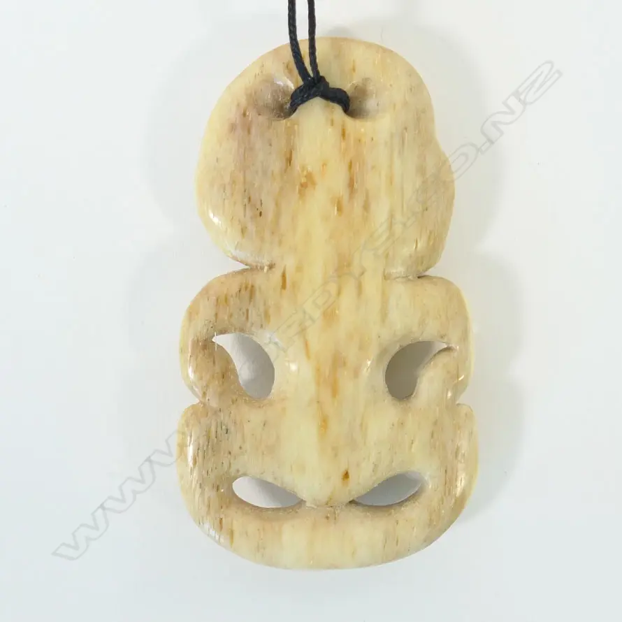 A contemporary whalebone carved Māori hei tiki, Image 1++