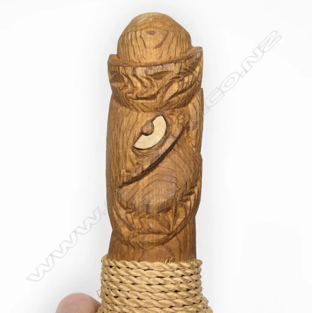 A Māori trumpet with carved wooden mouthpiece trumpet Image 1++