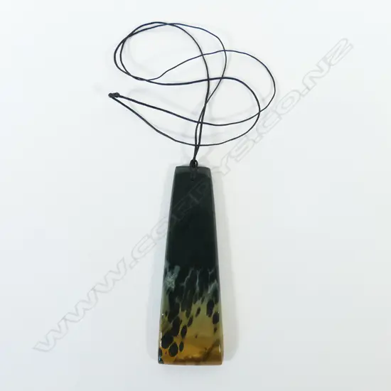 A contemporary Māori pounamu hei toki,