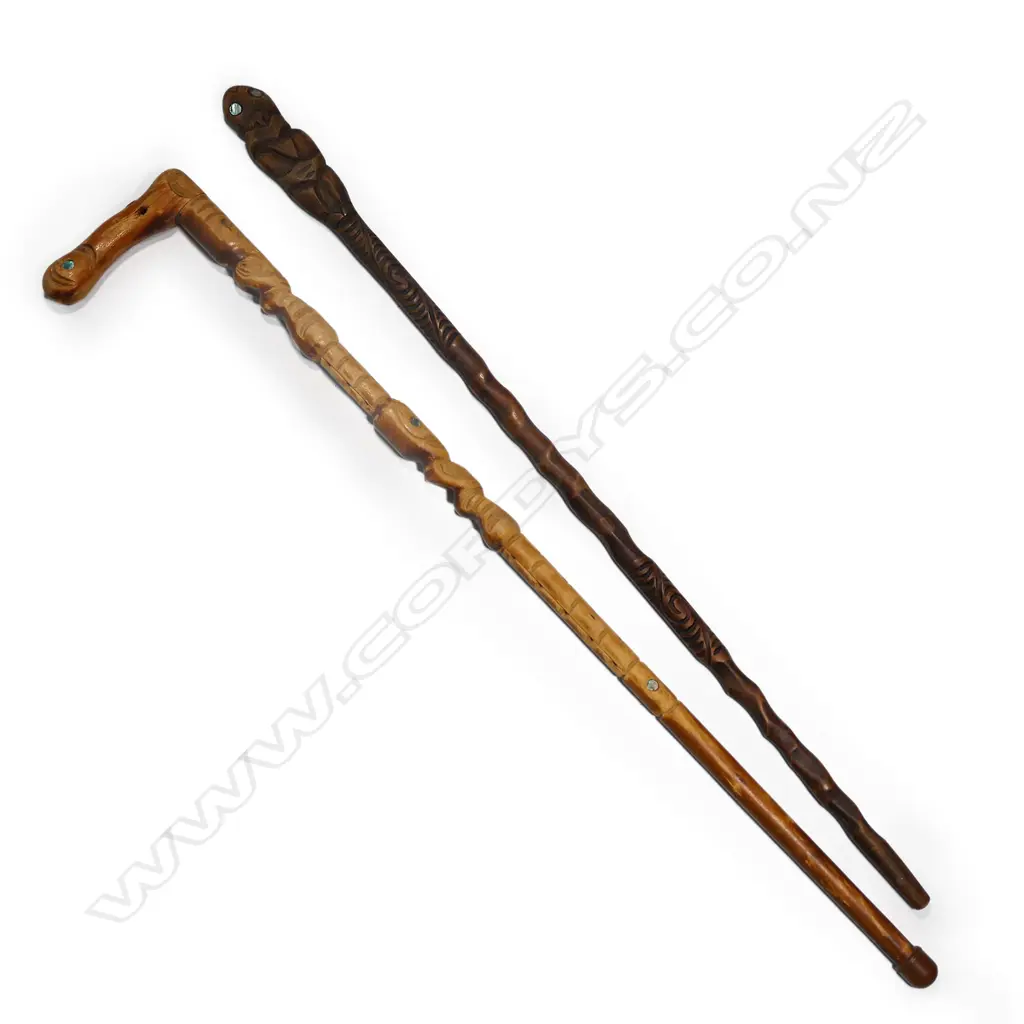 Two Māori folk art carved walking sticks Image 1++