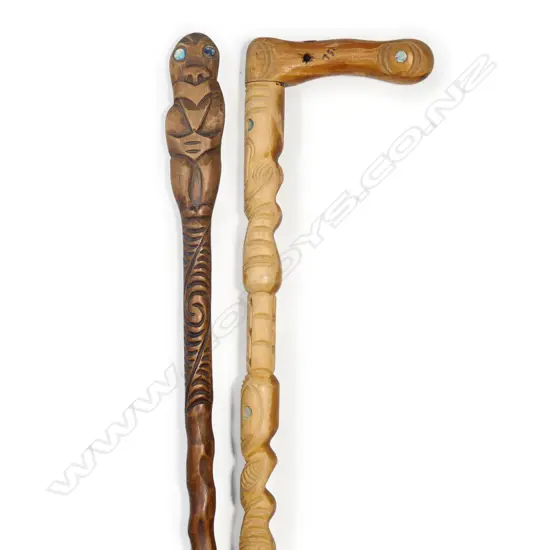 Two Māori folk art carved walking sticks
