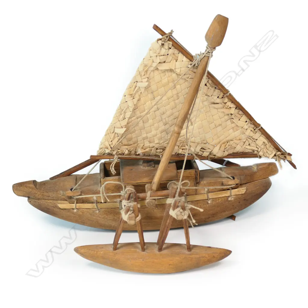A small 1960's model Fijian outrigger canoe Image 1++