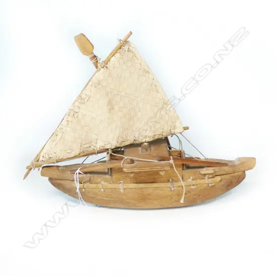 A small 1960's model Fijian outrigger canoe