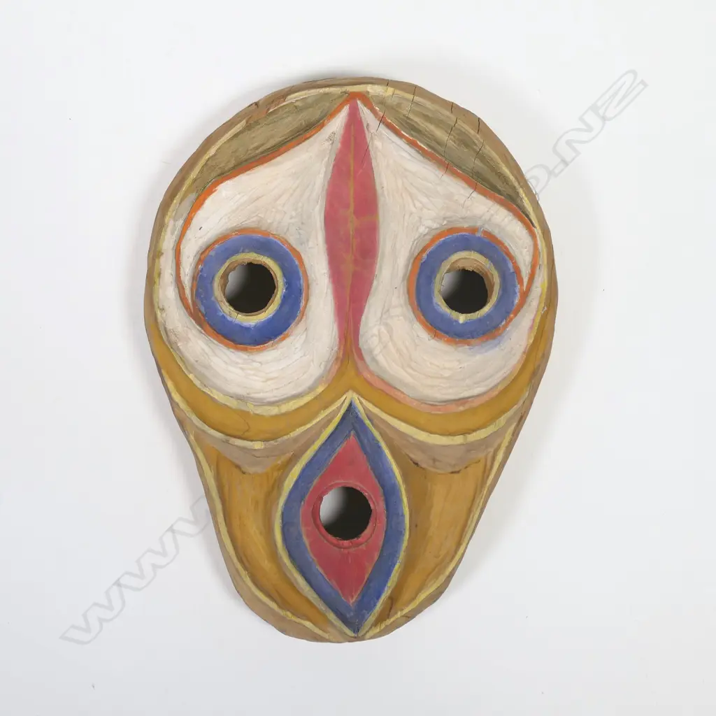 A hand-painted ethnic ghost mask Image 1++