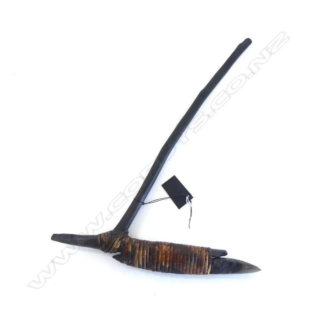 An old Asmat stone and wood hafted adze Image 1++