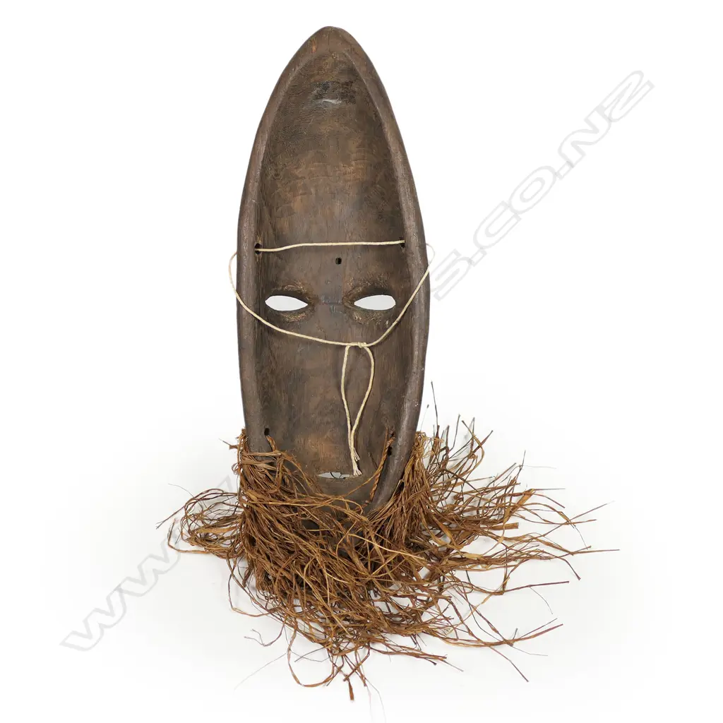 An African Dan passport mask with pierced eyes and mouth, Image 1++