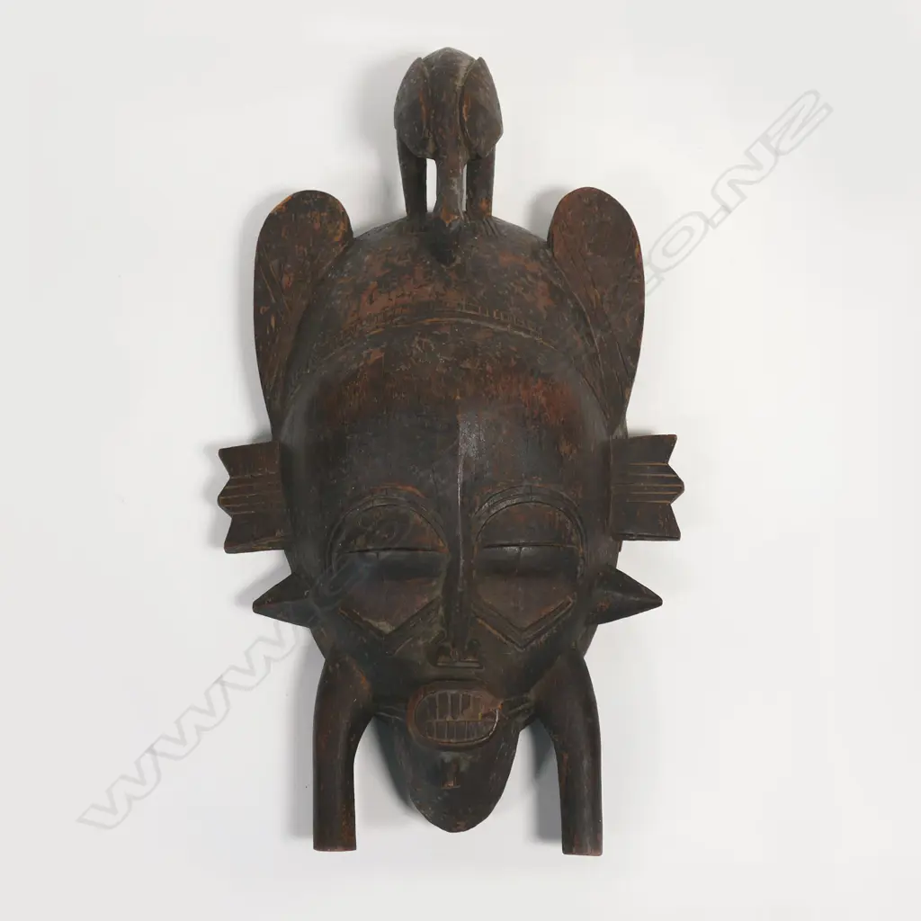 An African vintage carved bird face mask Image 1++
