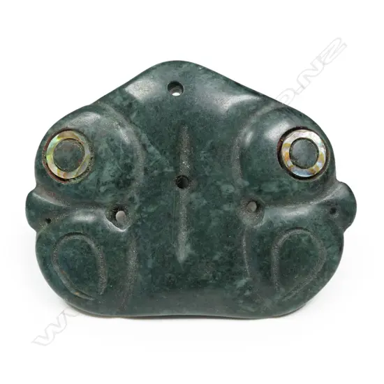A Mike Higgs carved greenstone pekapeka,
