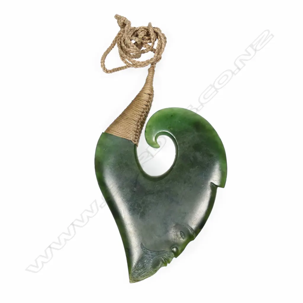A Nathan Jerry Kahurangi pounamu “Sea God” Hei Matau of stylised curved form, Image 1++