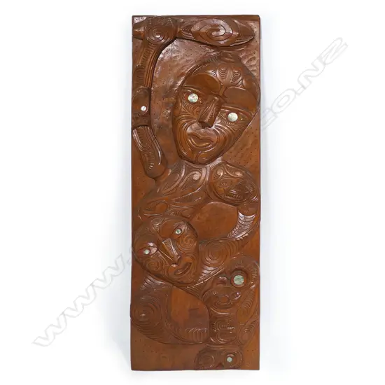 A c.1980s Māori carved tekoteko figured panel by Peter Hemi,