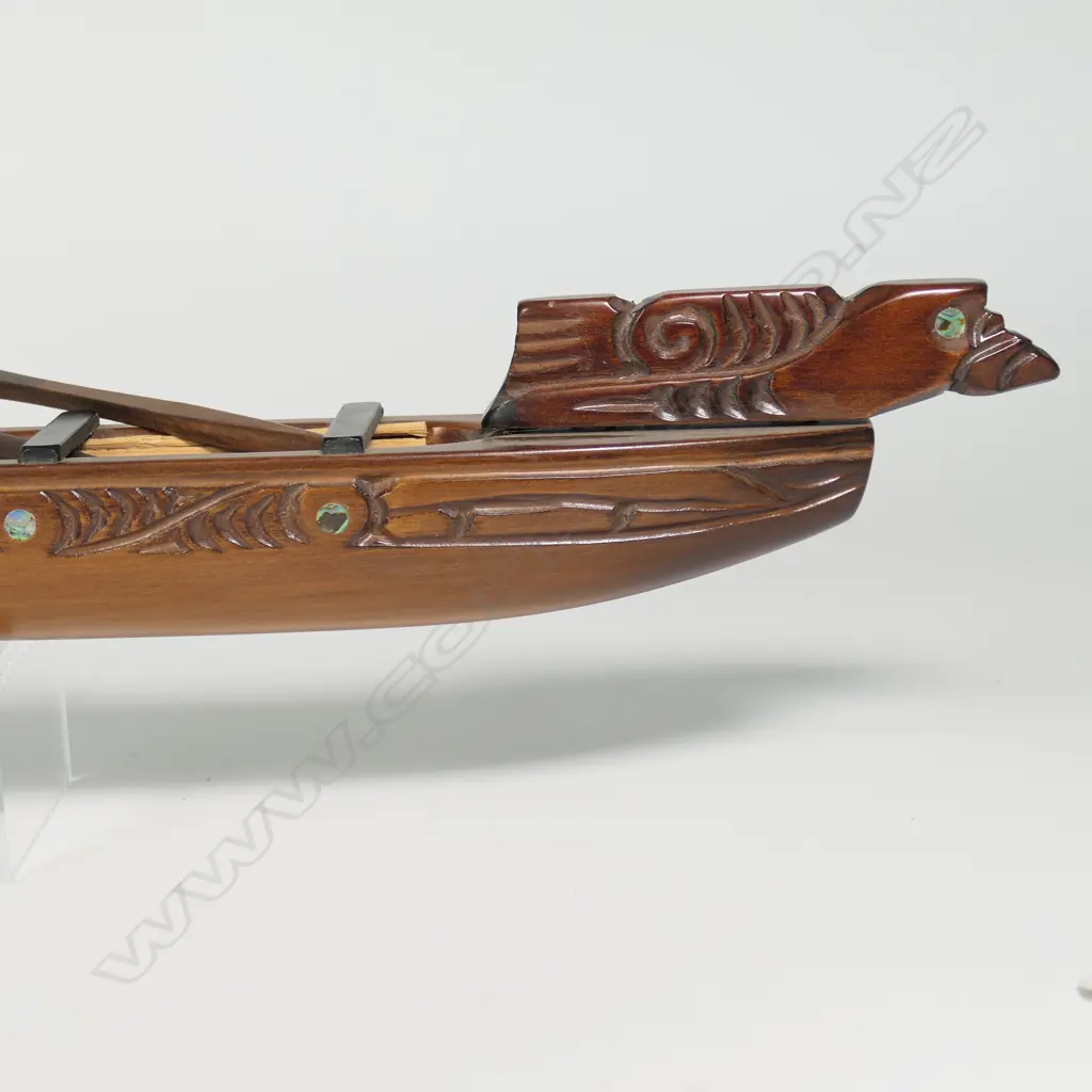 A Māori carved model waka by Bruse Larsen of Te Aroha, Image 1++