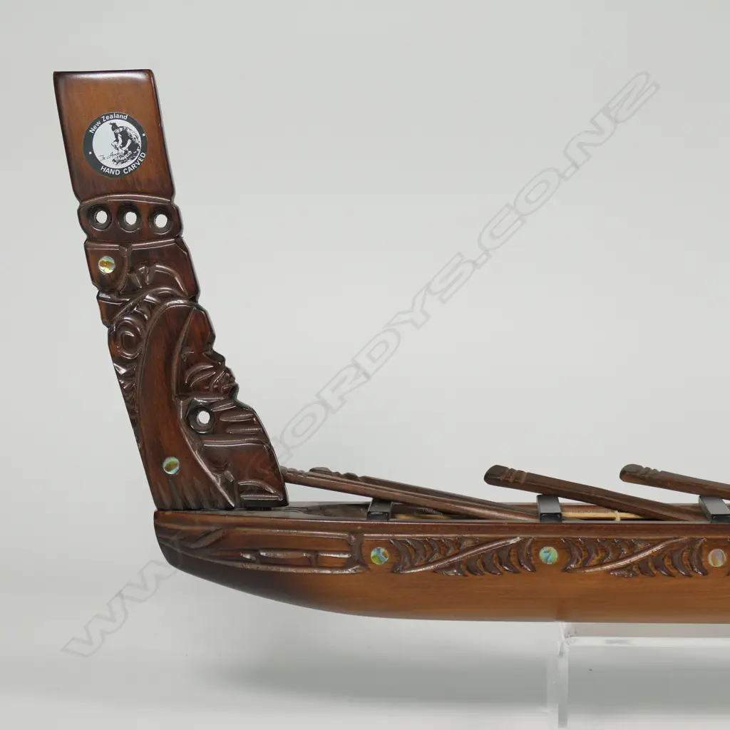 A Māori carved model waka by Bruse Larsen of Te Aroha, Image 1++