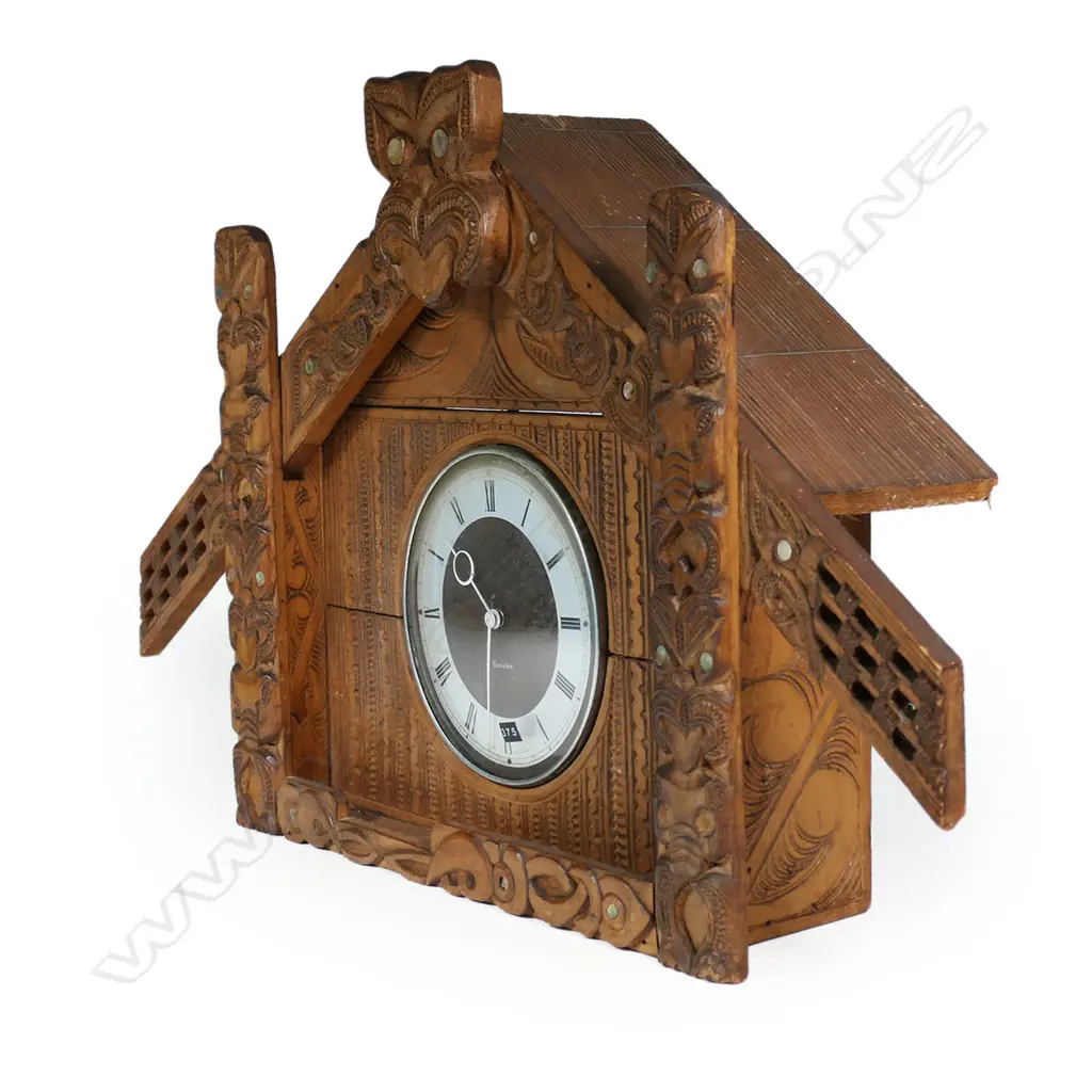 A large c.1950's Māori whare carved frame mantle clock, Image 1++