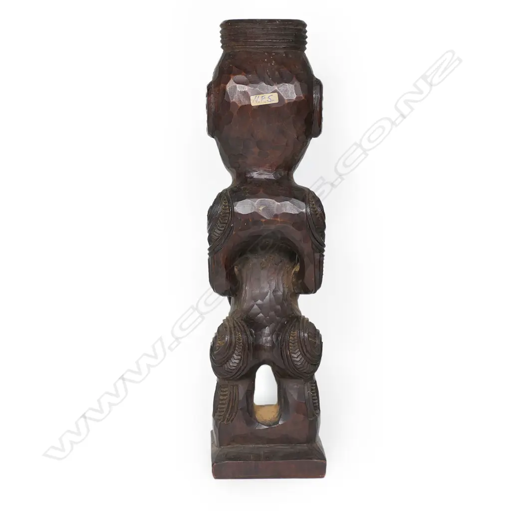 A c.1970a Māori carved tekoteko figure , with spiral, kowhaiwhai and other carved detail, Image 1++