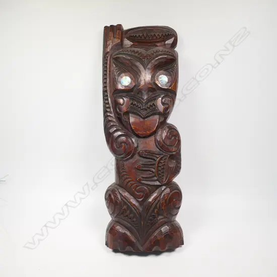 A Māori carved tekoteko panel figure,