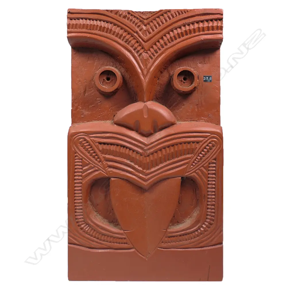 A vintage Māori carved stylised mask panel, Image 1++