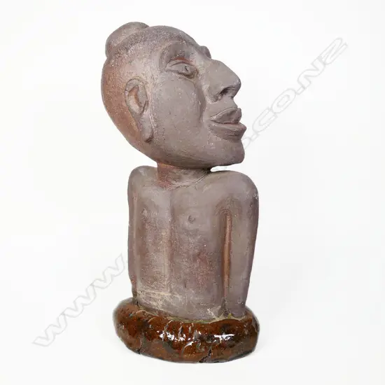 A hand sculpted terracotta figure of Rangi (Sky Father),