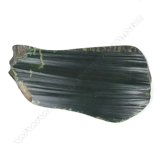 A large hand cut slab of pounamu (nephrite),