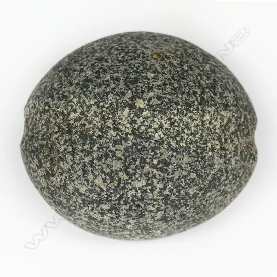 A pre-European Māori diorite (granite type) mahi (fishing sinker),