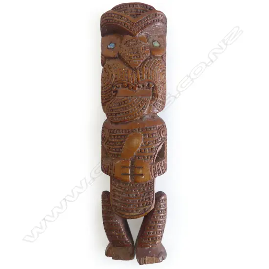 A carved Wooden Māori Tekoteko Figure,