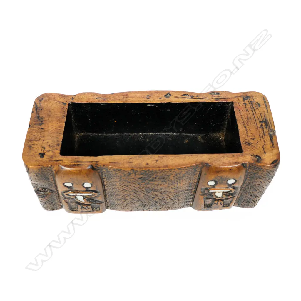 A carved Māori lidded heavy wooden box with paua inlay, Image 1++