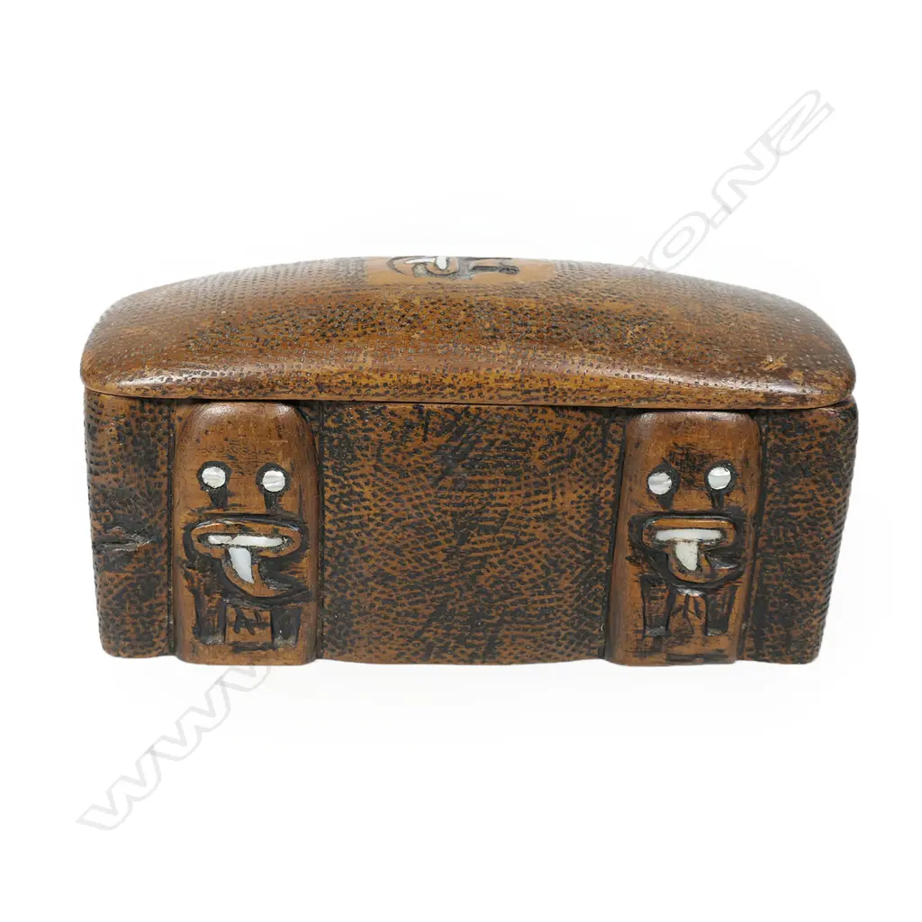 A carved Māori lidded heavy wooden box with paua inlay, Image 1++