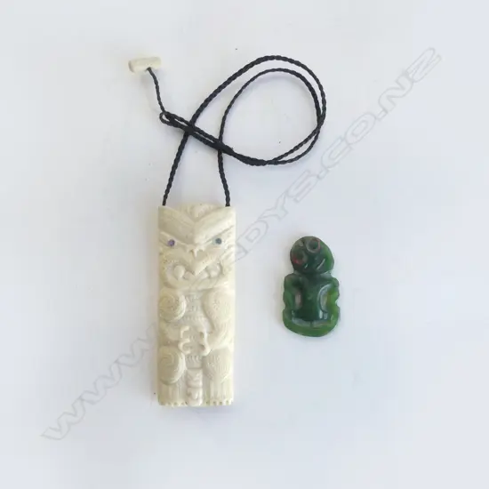 Two small Māori carvings; bone pendant and pounamu Hei Tiki,