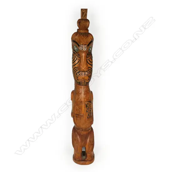 A large and impressive Māori carved poutokomanawa with all-over carved detail,