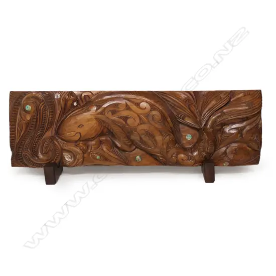 A Māori trout carved rectangular panel,