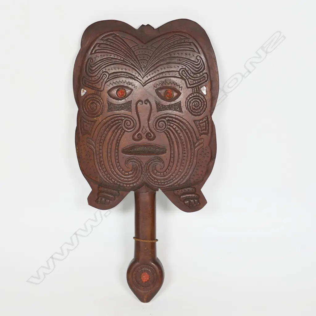 A carved wooden Māori patu, Image 1++