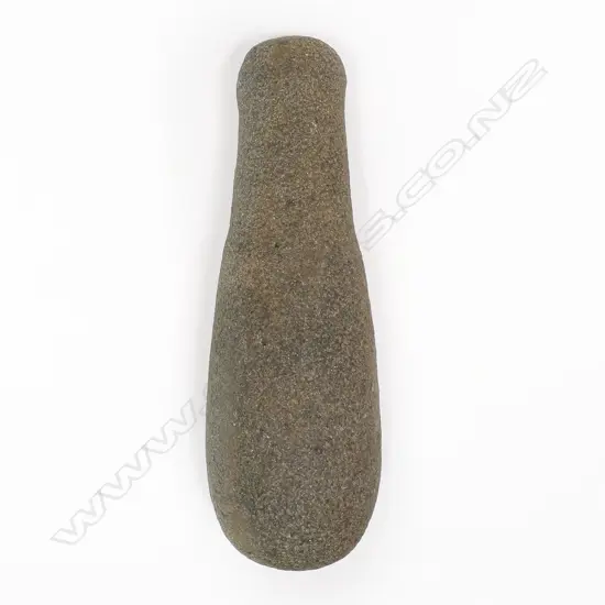 A pre-European Māori patu muka (stone pounder)