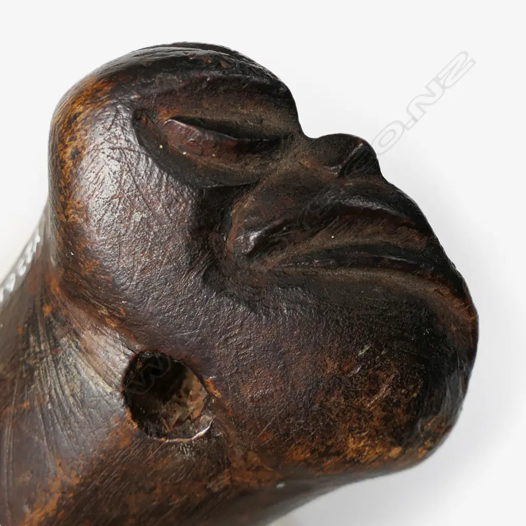 A finely carved 19thC Māori carved patu, Image 1++