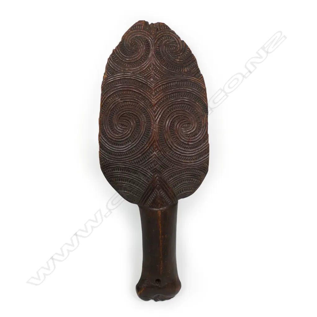 A finely carved 19thC Māori carved patu, Image 1++