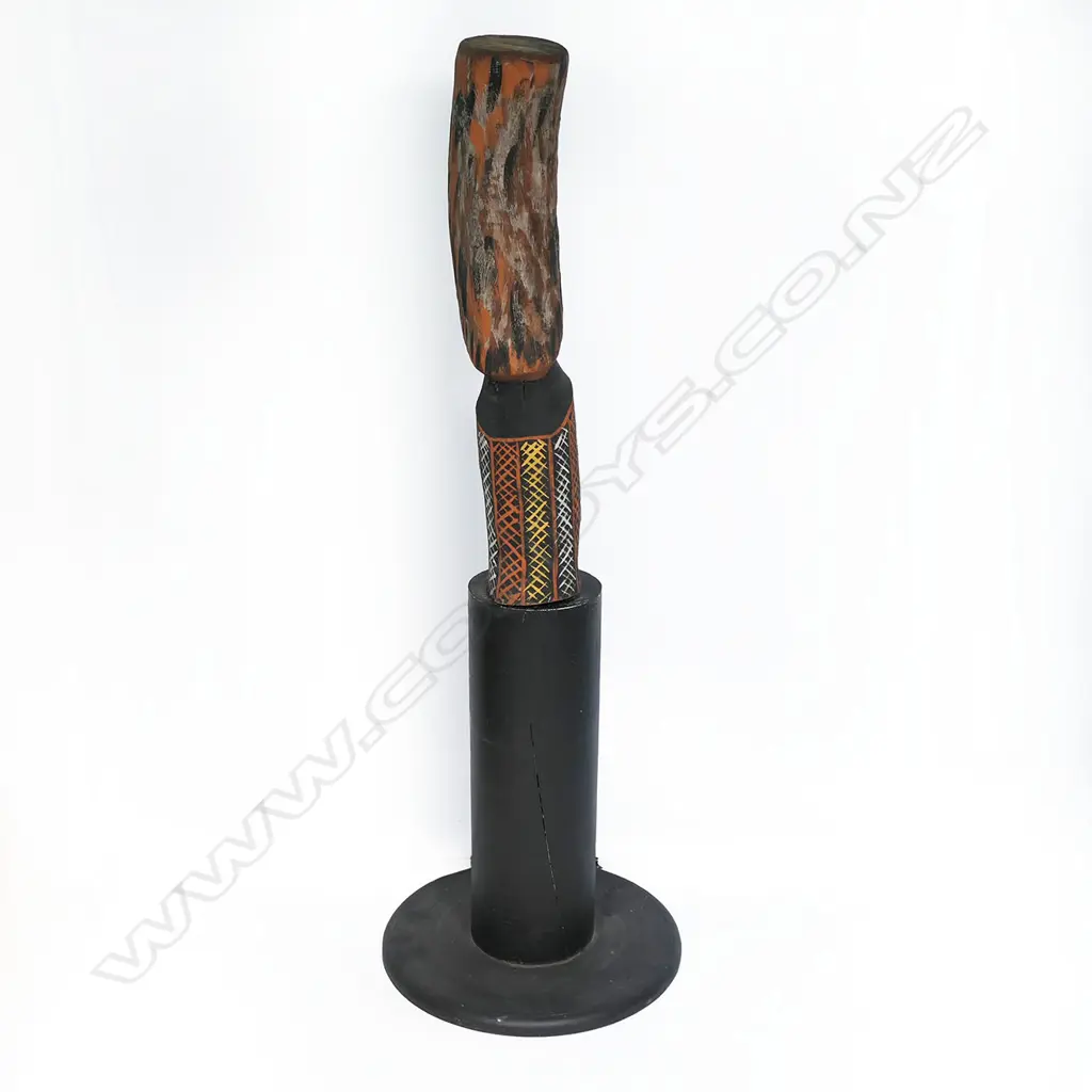 An Aboriginal painted wood carving on a plinth, Image 1++