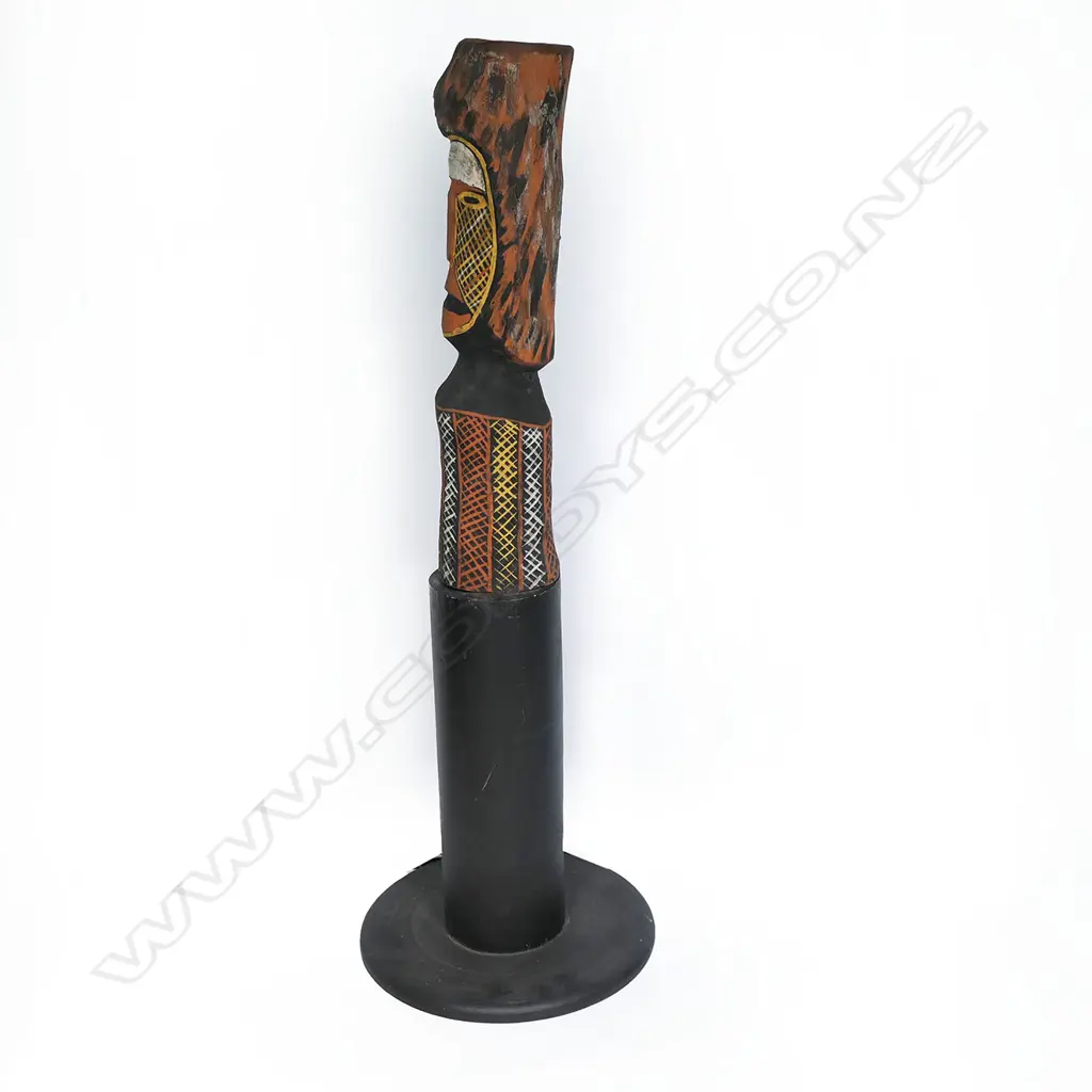 An Aboriginal painted wood carving on a plinth, Image 1++