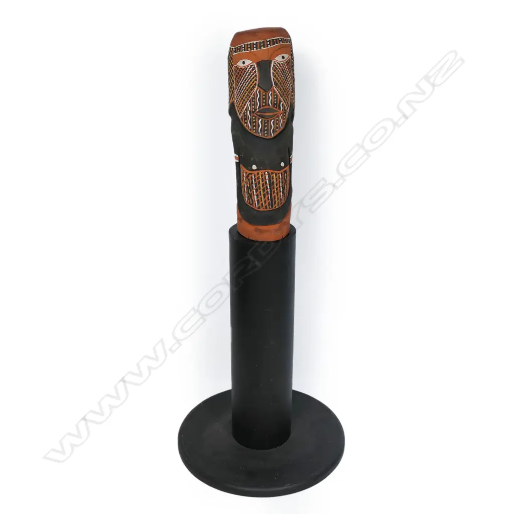 An Aboriginal painted wood carving on a plinth, Image 1++