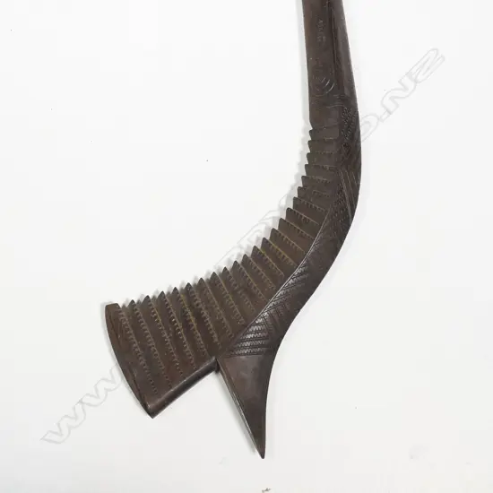 A finely carved 20thC Fijian Gata (Gunstock) war club,