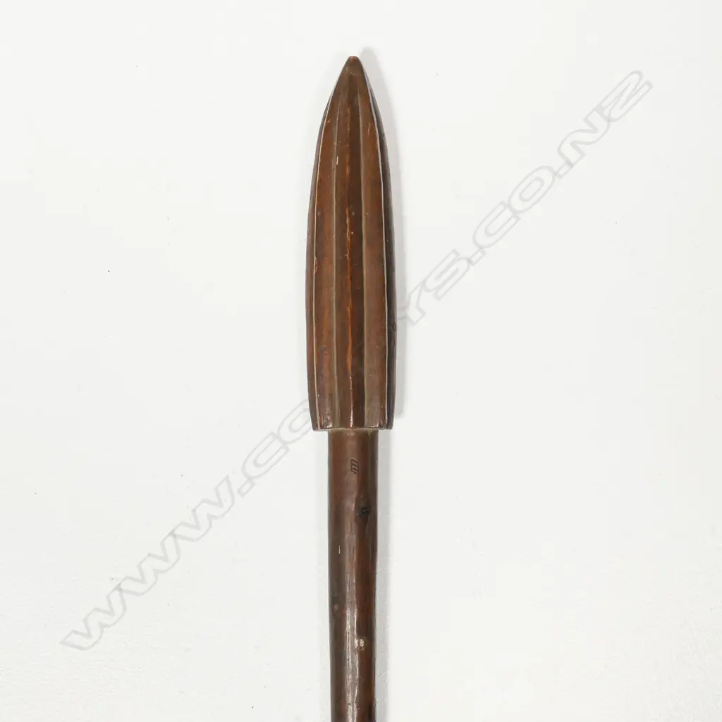 A tribal wooden pounder with partitioned head Image 1++