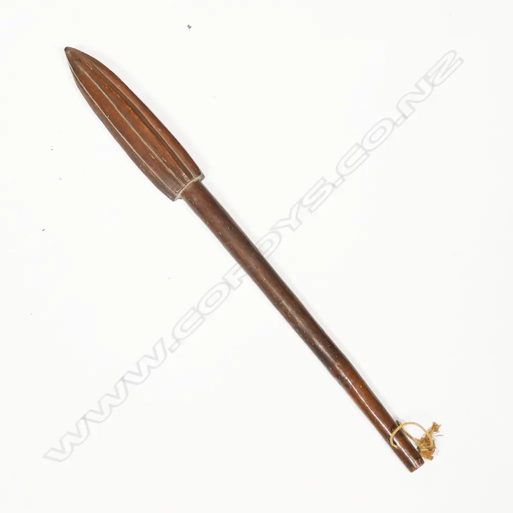 A tribal wooden pounder with partitioned head Image 1++