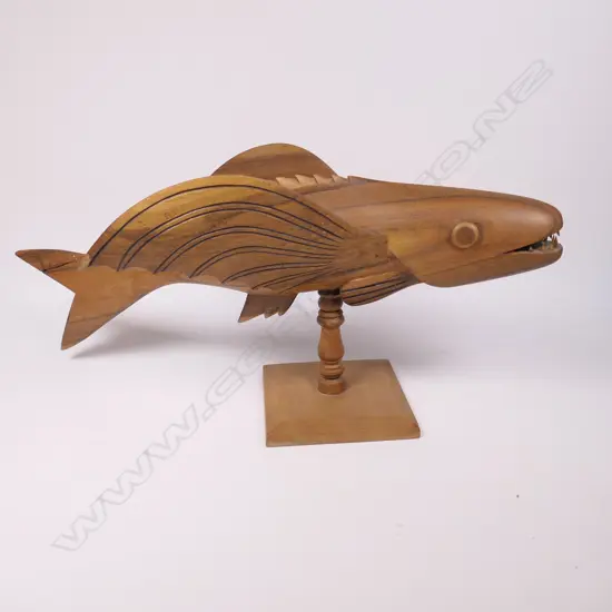 A Pitcairn Island carved wooden flying fish,