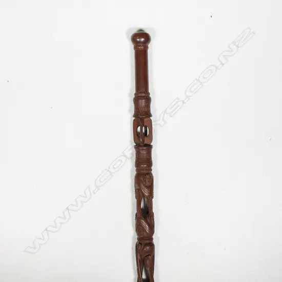 A vintage carved ebony Trobriand Island (PNG) walking stick,