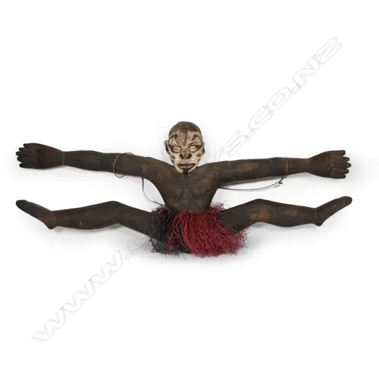 A PNG Sepik River food hook in the shape of a figure with outstretched limbs,