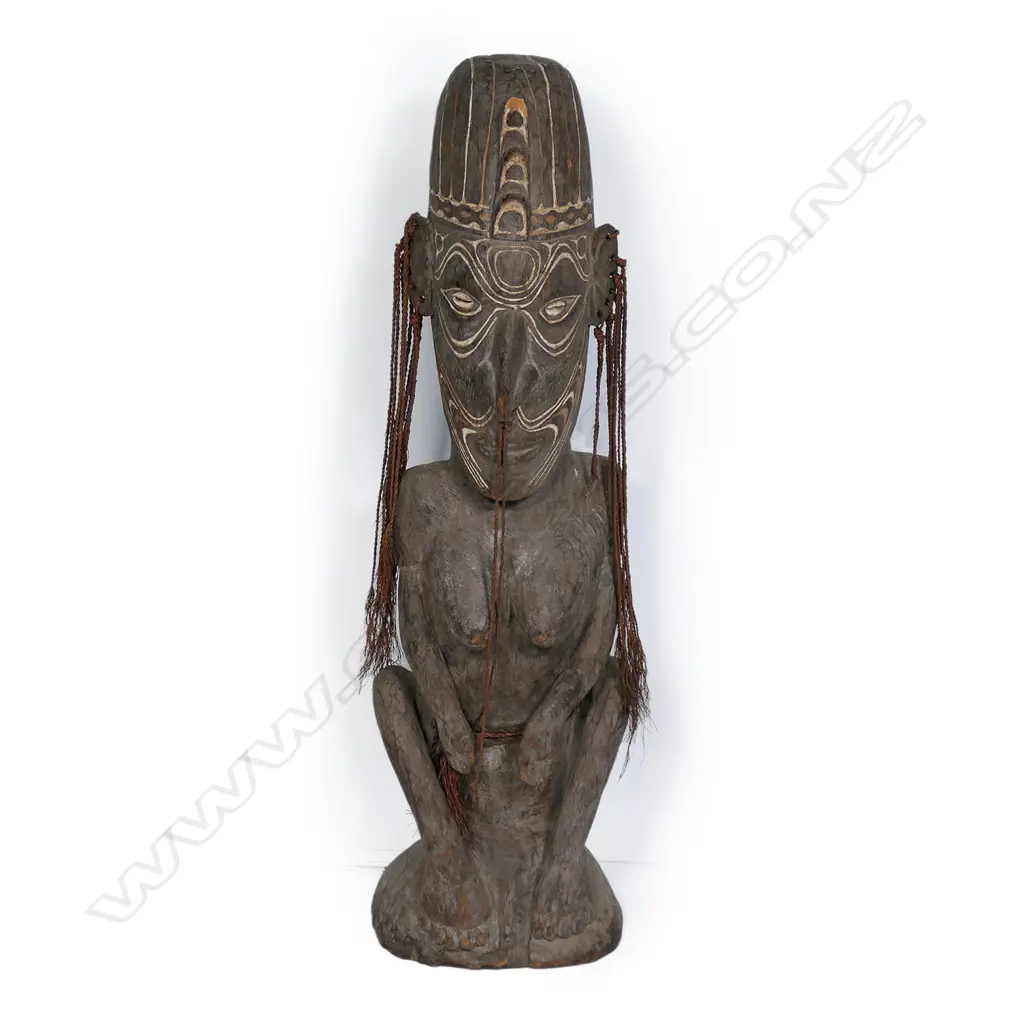A PNG Sepik River carved wooden female figure, Image 1++