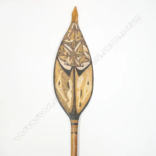 A PNG large carved wooden canoe paddle,