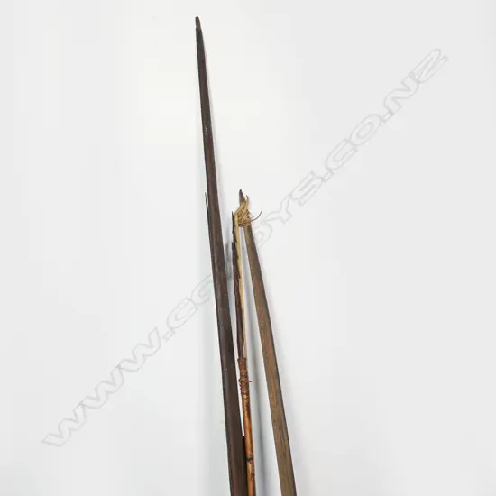 A pair of PNG hunting bows and six arrows,