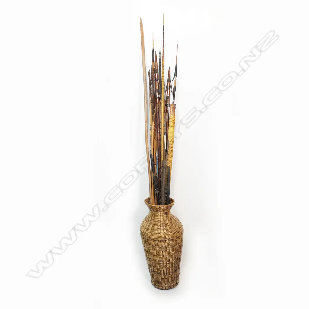 A cane basket of PNG fishing spears, Image 1++