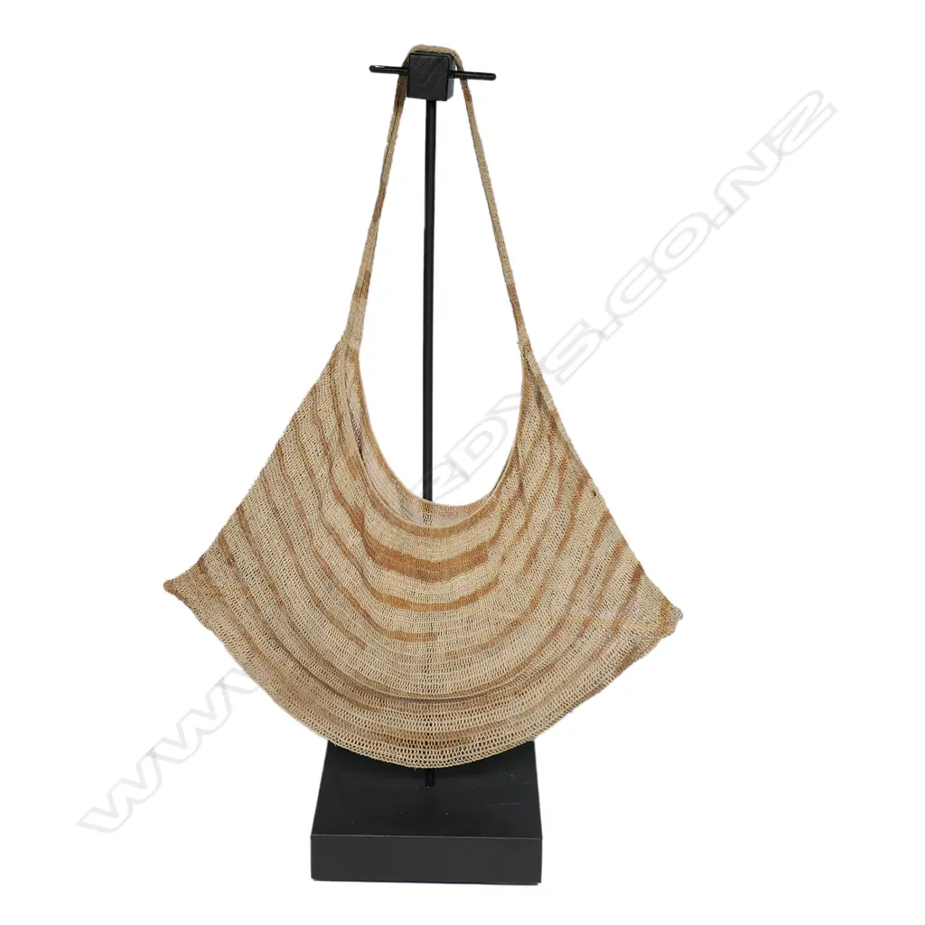 A pre-1960 PNG Mount Hagen bilum bag on display stand, Image 1++